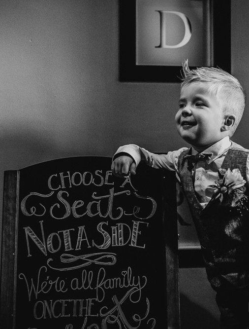 Young Lux in front of his magic show